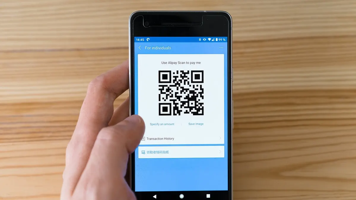 Smartfon z ekranem płatności i ustawieniami subskrypcji